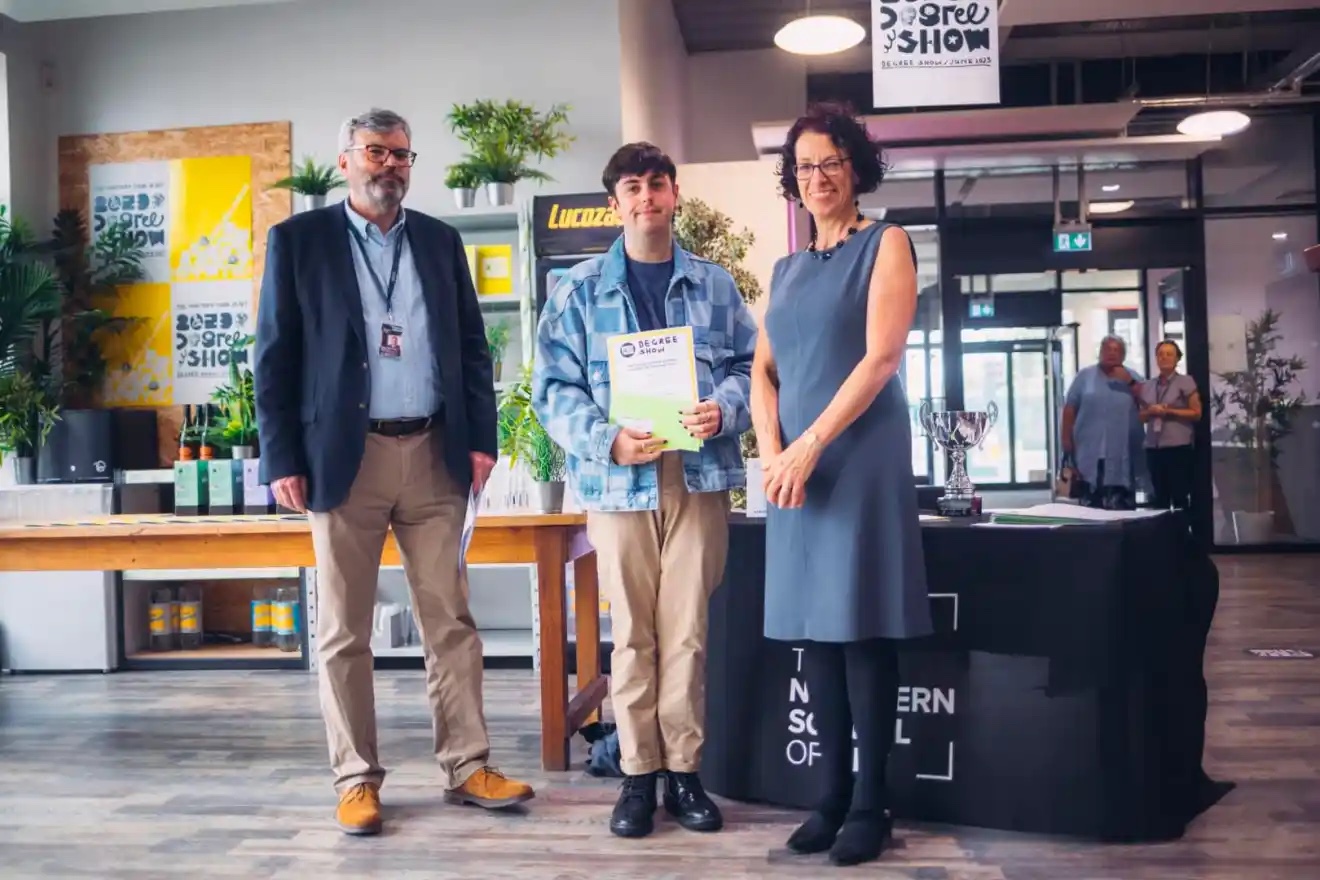 Robin at the award ceremony with his Student of the Year award. Accompanied by Principal Martin Raby and a School Governor.